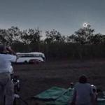 Glenn Schneider basks in the moon's shadow during a 2012 total solar eclipse in Australia. 